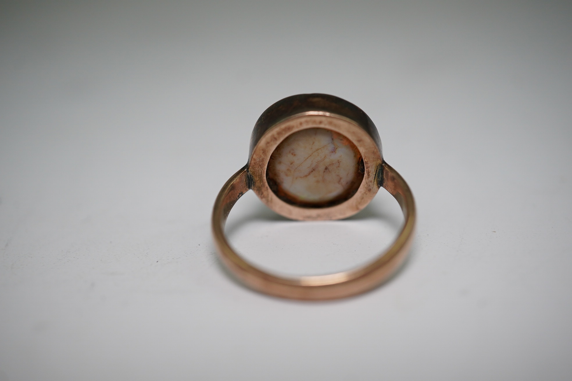 A 9ct gold opal dress ring, size J, gross weight 4.1 grams.